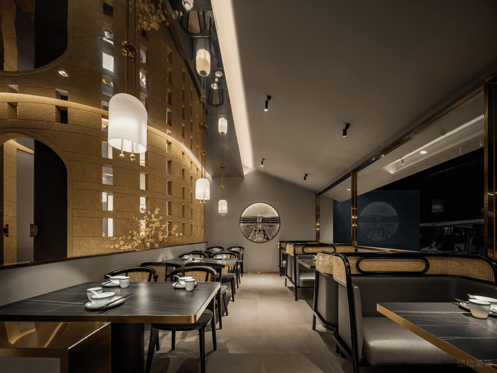 深圳龍崗海航城輕奢新中式客家菜餐廳裝修案例圓形藝術(shù)裝飾畫