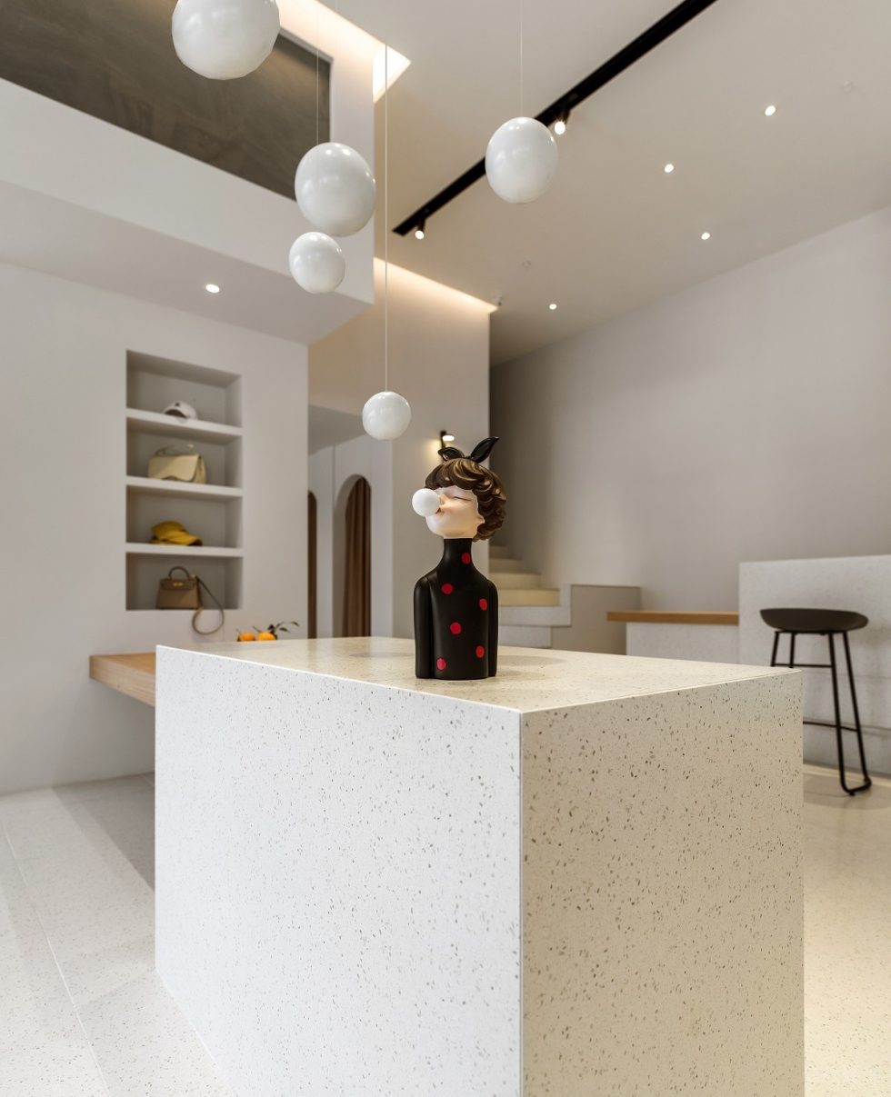 深圳市龍崗區(qū)橫崗現(xiàn)代風(fēng)女裝店pin Xi「暗香 女裝」裝修設(shè)計(jì)大理石島臺(tái)