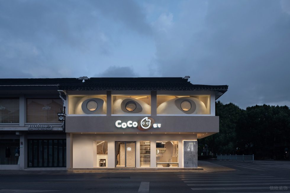原木工業(yè)簡約風飲品店造型特異的外觀裝修設計